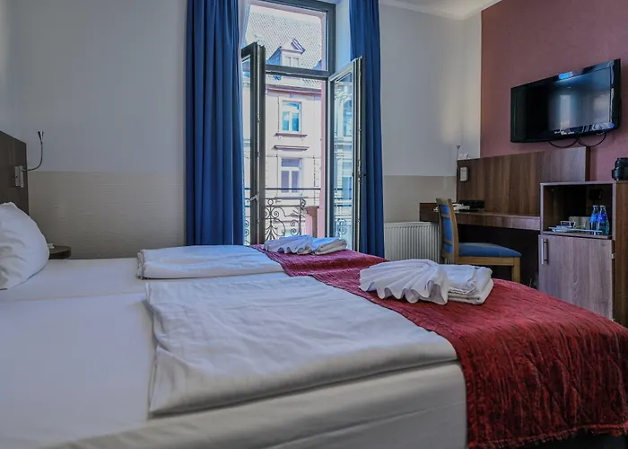 호텔 Ramada By Wyndham Frankfurt Station 4*